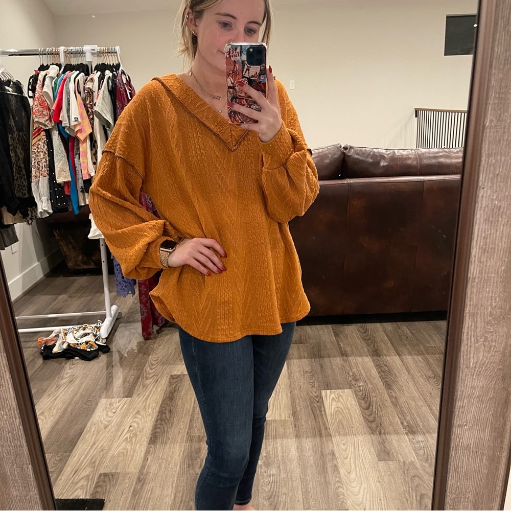 BiBi Orange V-Neck Sweater with Relaxed Fit